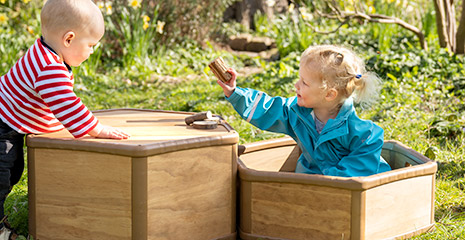 Two children playing in Toddler Outlast platforms.