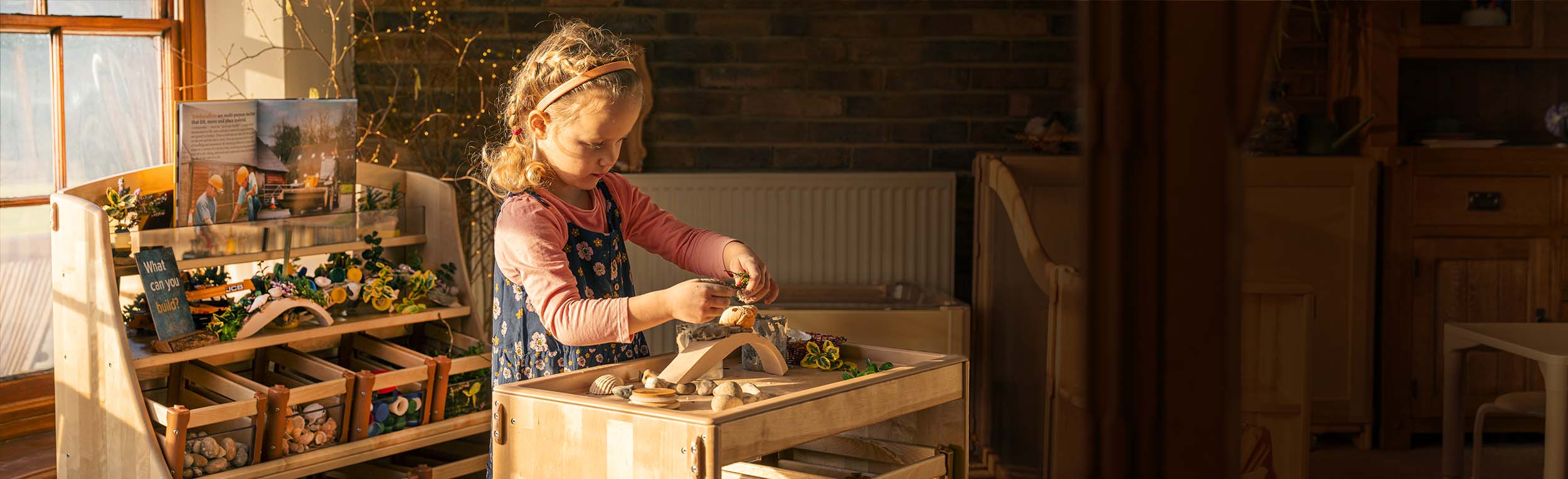 A girl building in a classroom