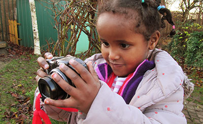 Three-year-old with camera