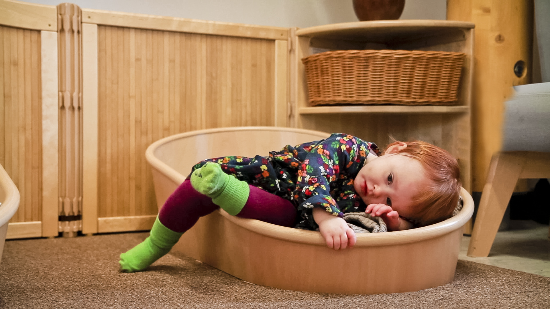 A child lies in the Dream coracle