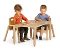 Two nursery aged boys sitting and table and doing puzzles