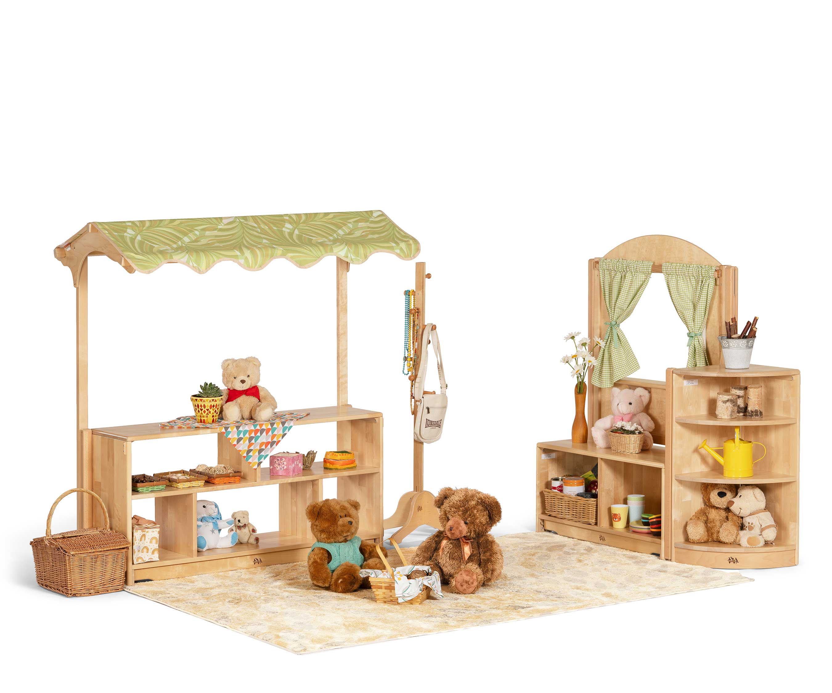 Role play area set up with teddy bears and dishes