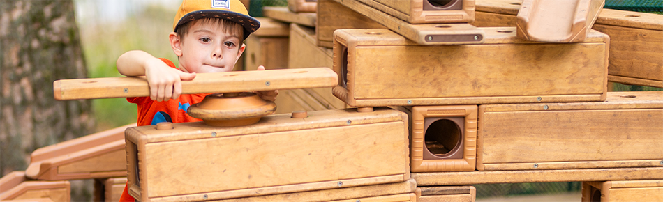 Boy building with Outlast blocks