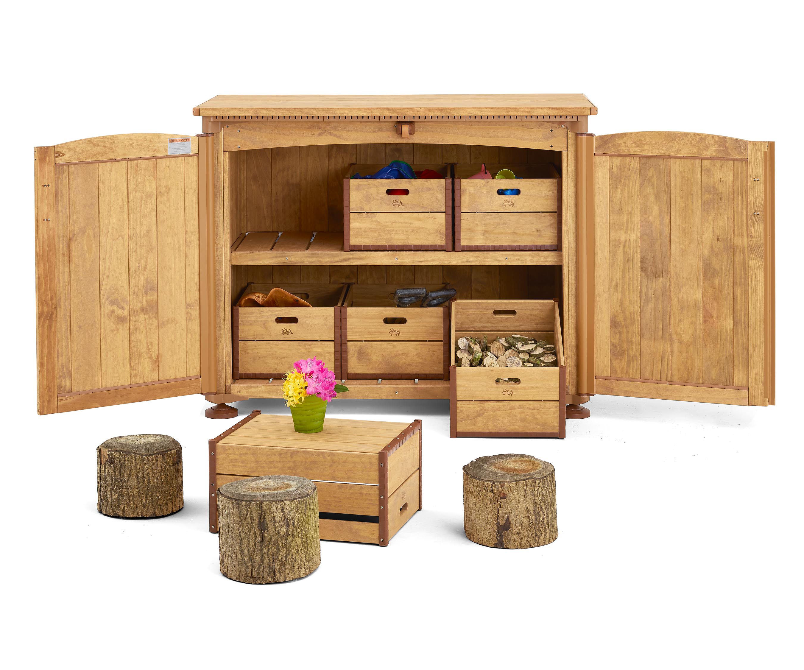 Stumps and a crate set up outside an Outlast storage unit.