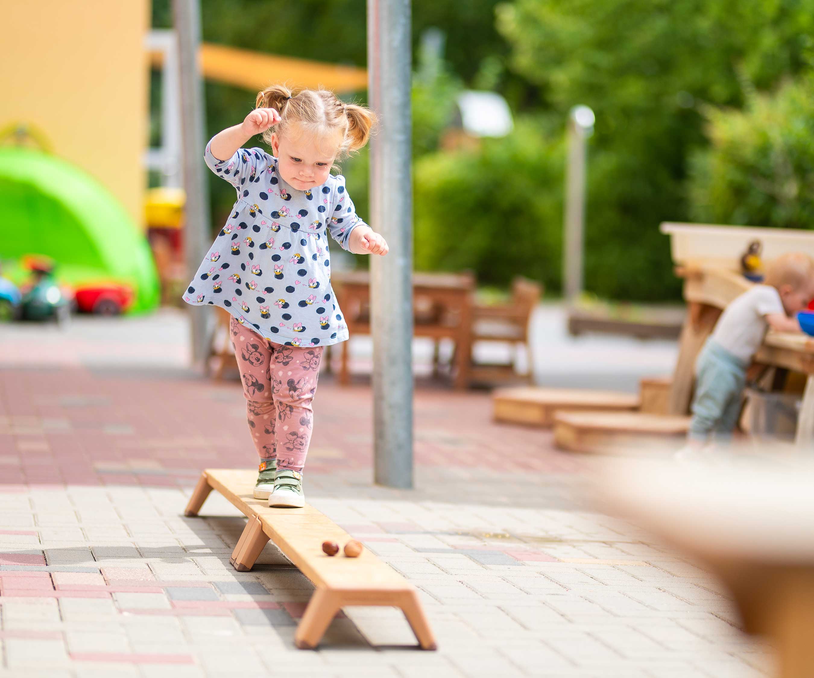 Girl on balancing beam