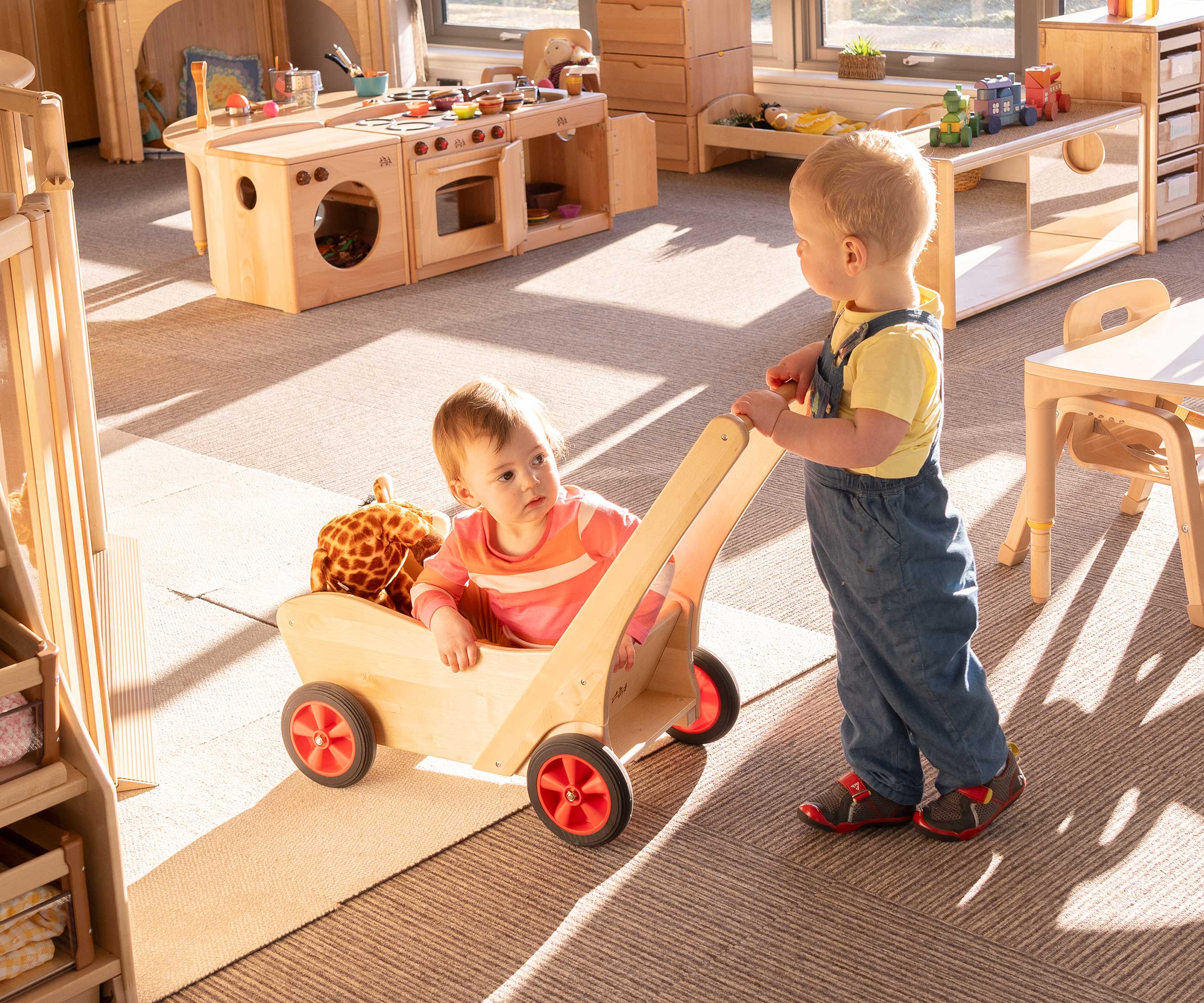 Boy and girl pushcart