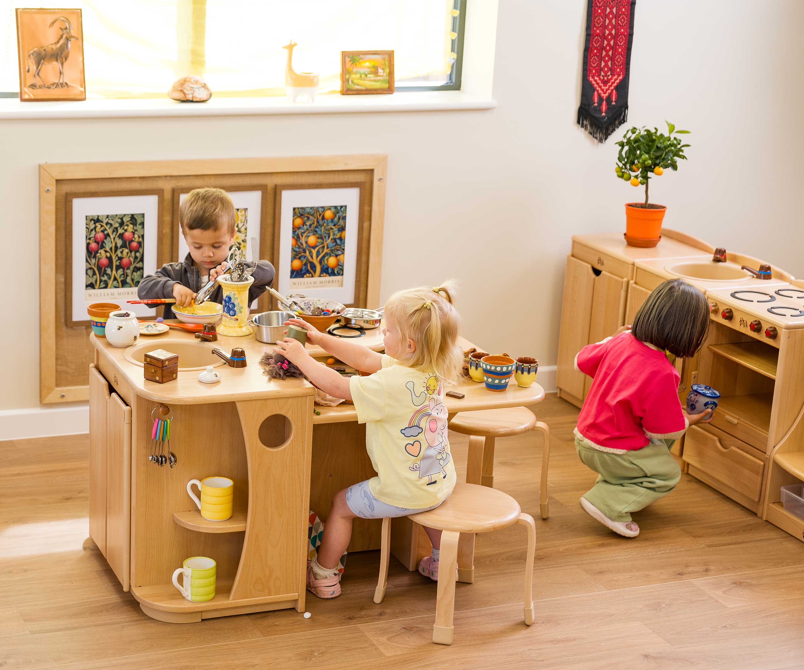 3 kids by high kitchen island