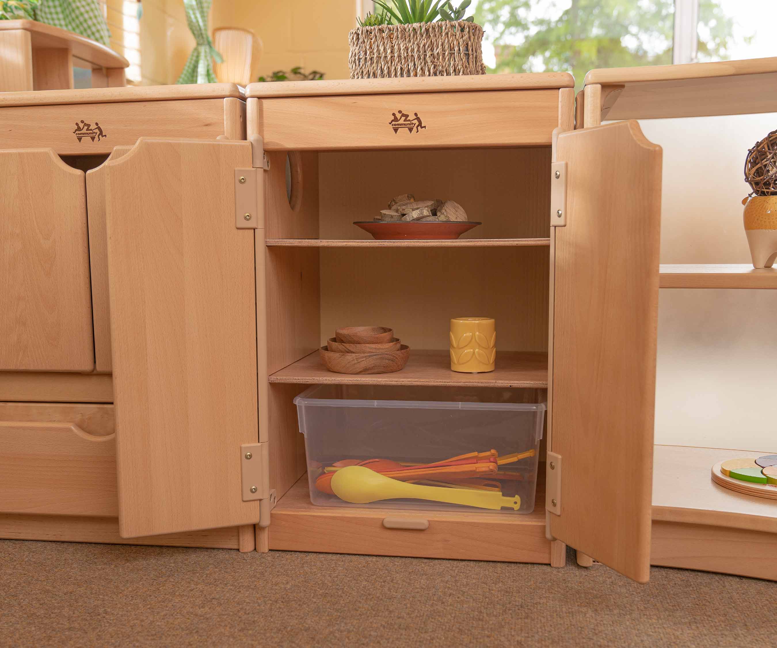 Fridge in nursery with toys inside