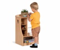 Child playing with Welsh dresser